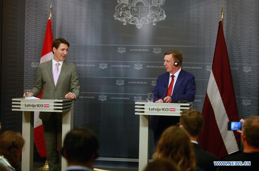 LATVIA-RIGA-CANADA-PM-VISIT-COMMITMENT