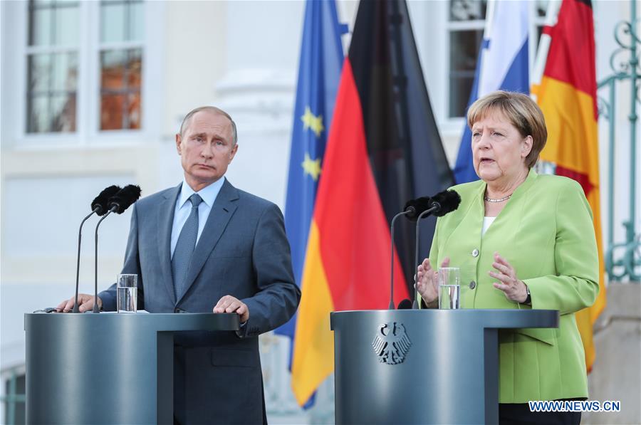 GERMANY-MESEBERG-MERKEL-RUSSIA-PUTIN-MEETING