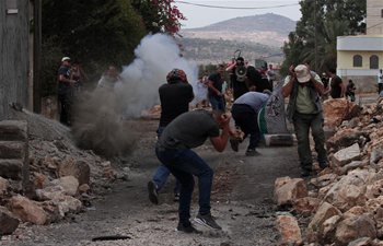 Palestinian protesters clash with Israeli soldiers near West Bank city of Nablus